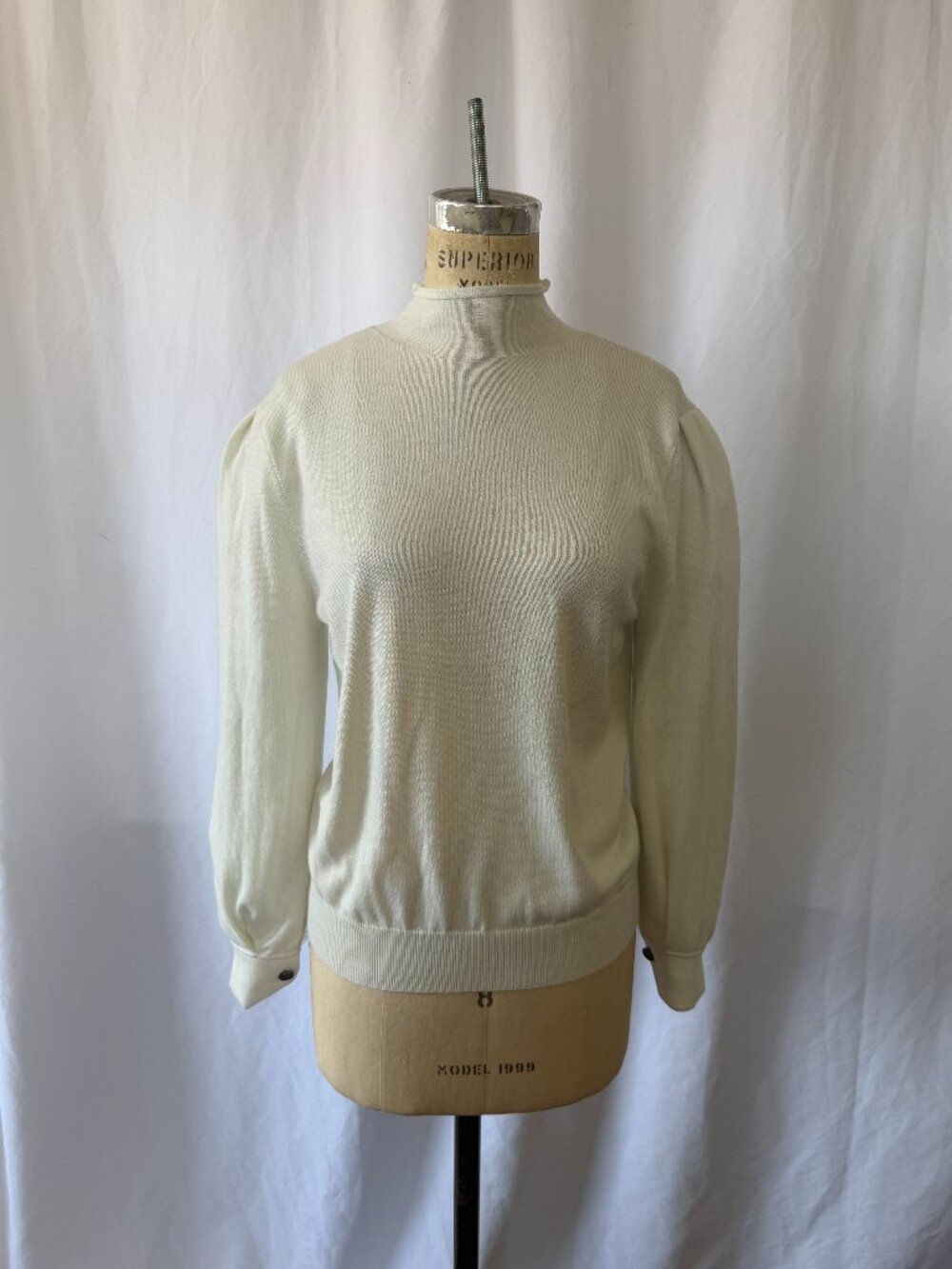 Cream color knitted sweater